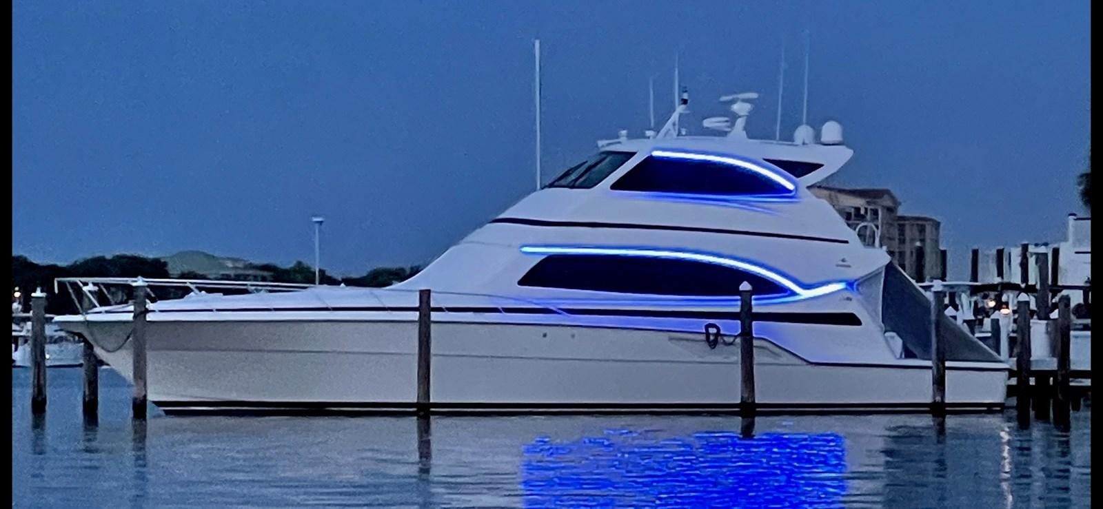 a white yacht in the water aboard REEL BUSY Yacht for Sale