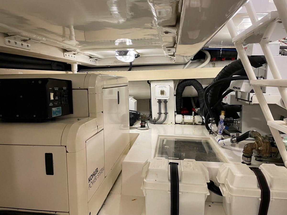 a machine in a room aboard REEL BUSY Yacht for Sale
