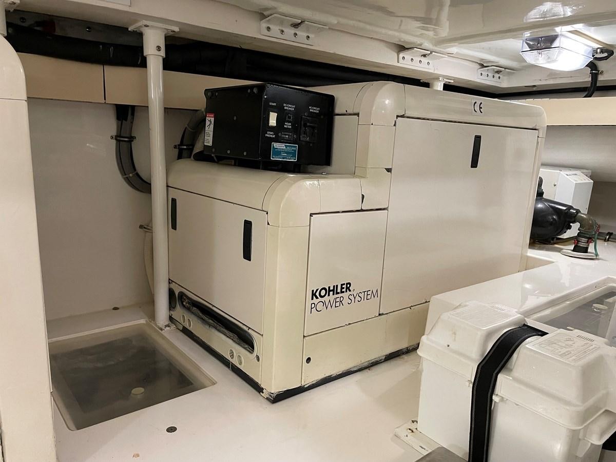 a machine in a room aboard REEL BUSY Yacht for Sale