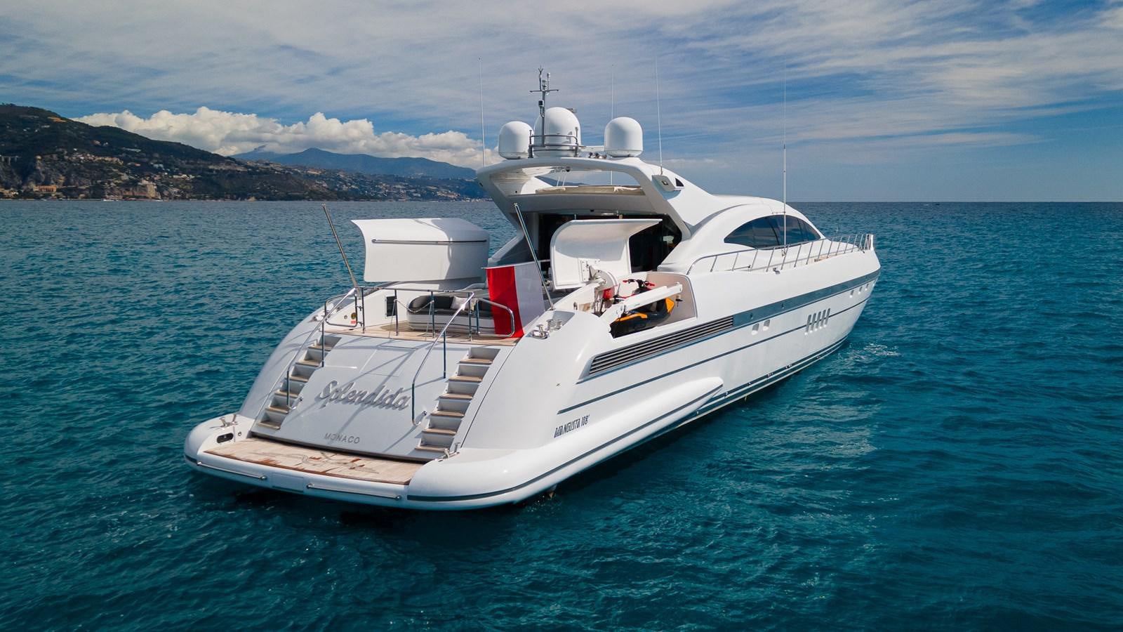 a white boat in the water aboard SPLENDIDA Yacht for Sale