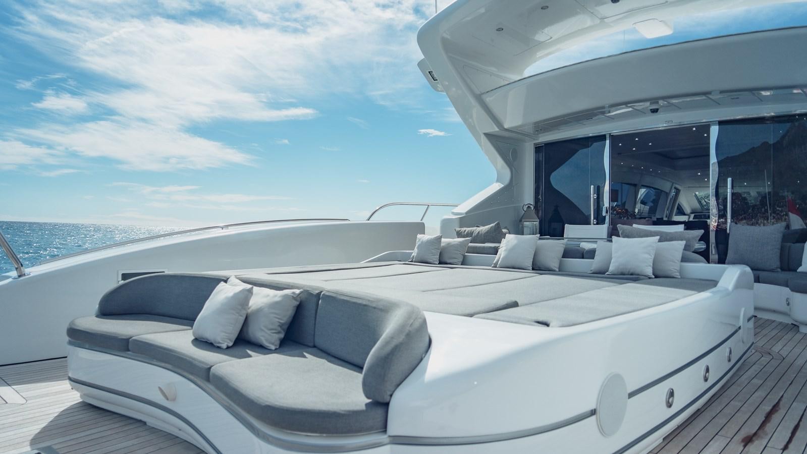 a white couch on a boat aboard SPLENDIDA Yacht for Sale