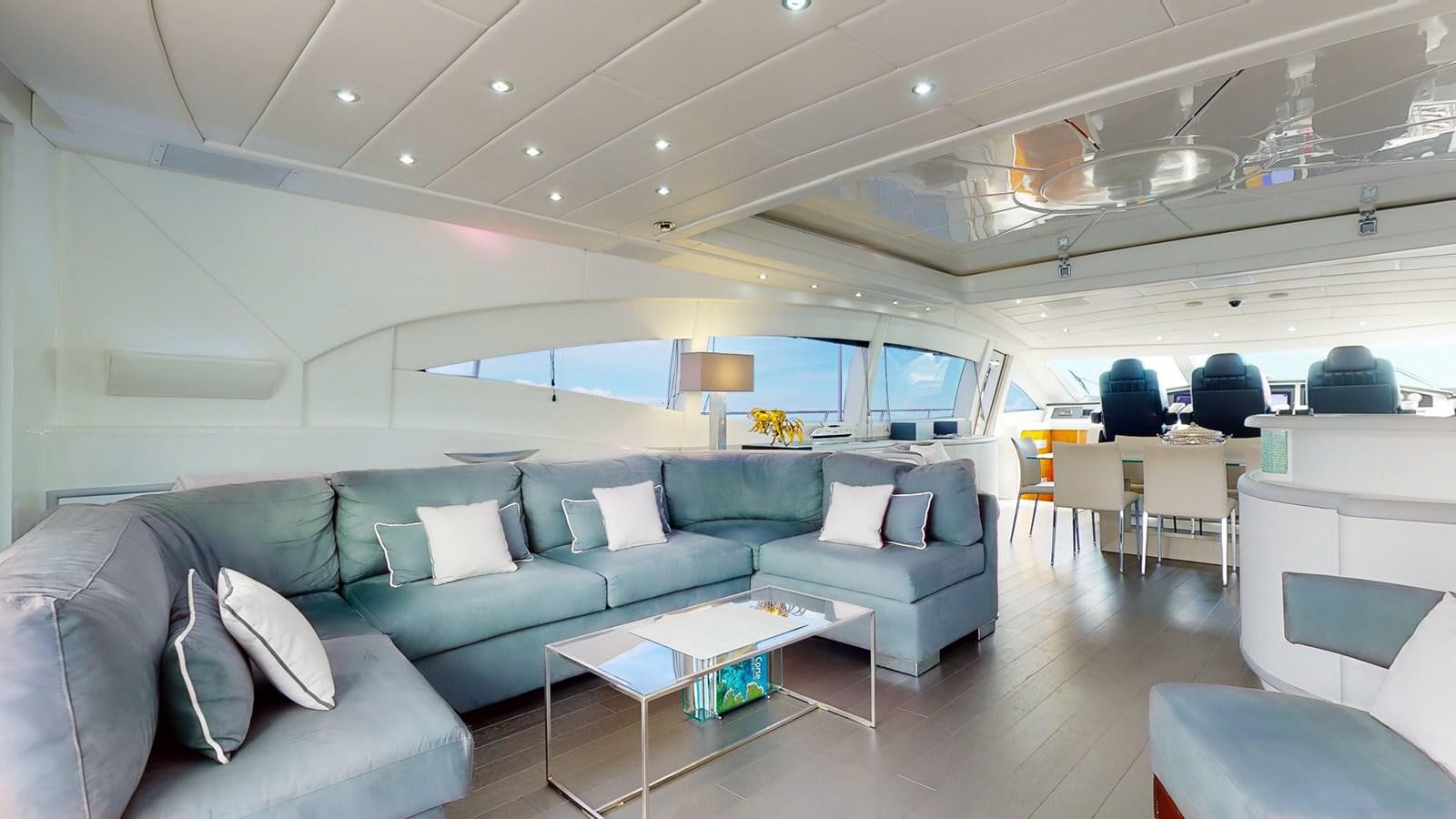 a living room with a couch and a table aboard SPLENDIDA Yacht for Sale
