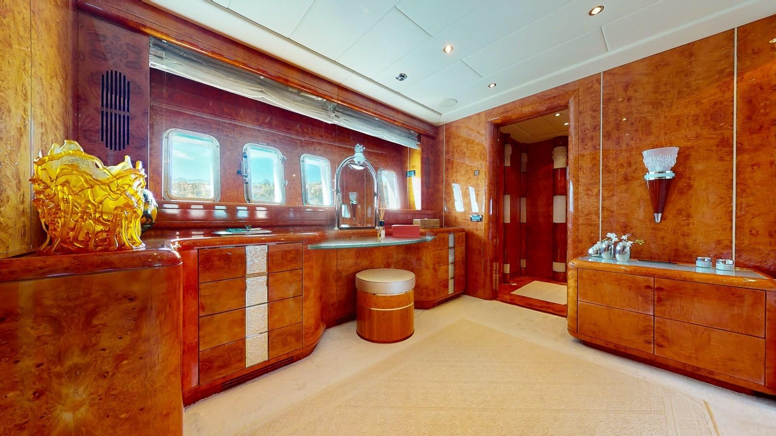a large kitchen with wooden cabinets aboard SPLENDIDA Yacht for Sale