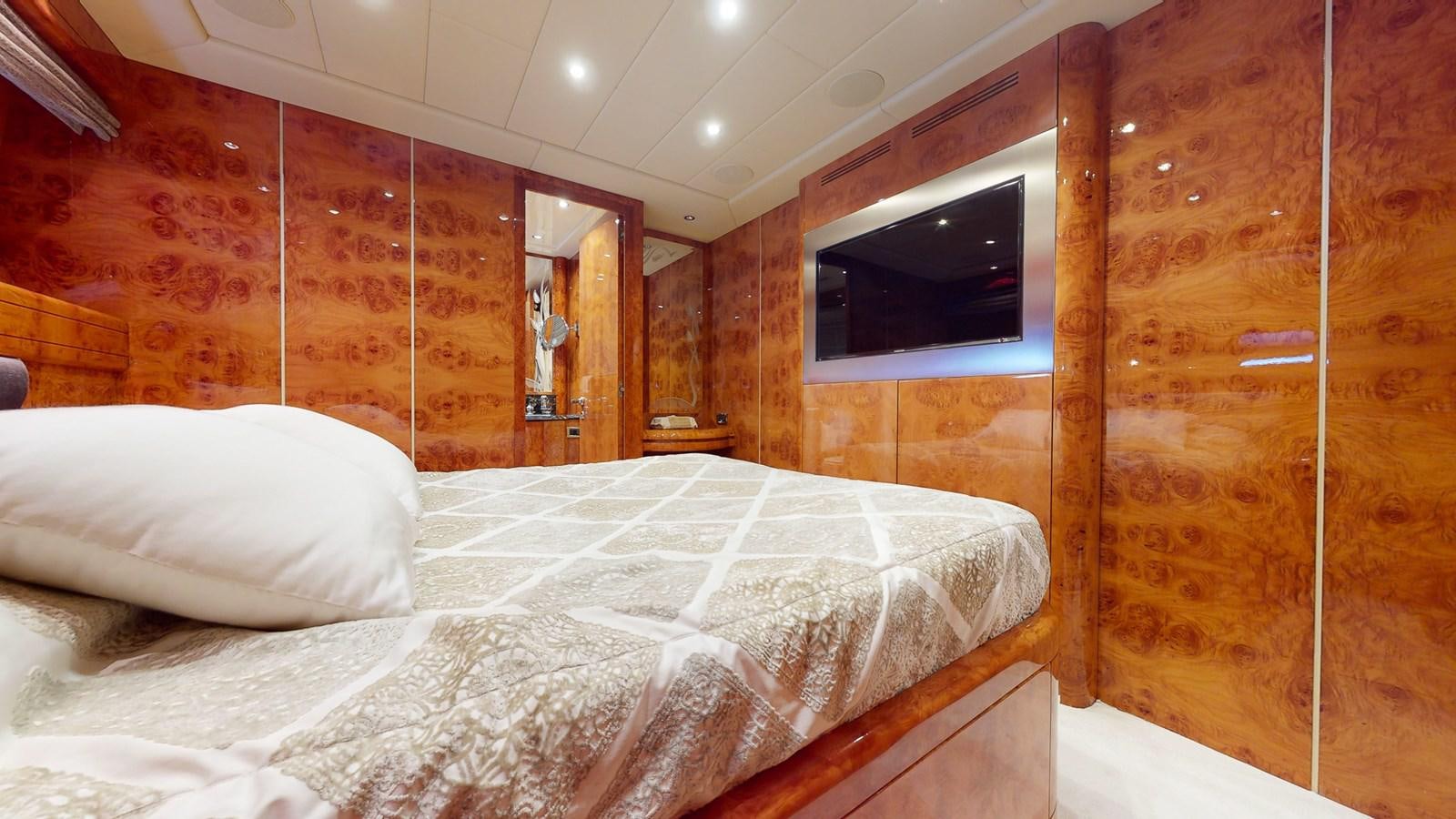 a bed with a white sheet aboard SPLENDIDA Yacht for Sale