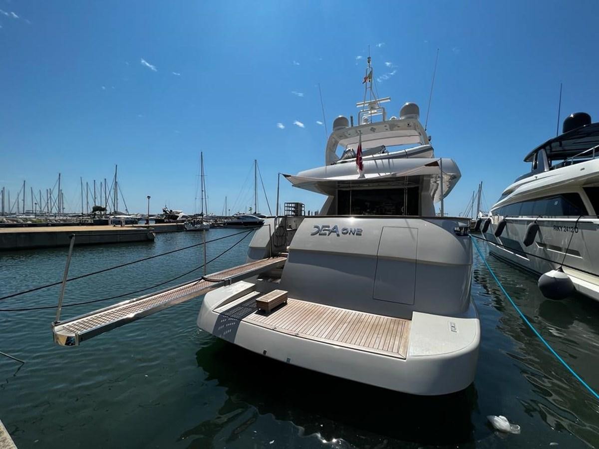 a boat docked at a pier aboard DEAONE Yacht for Sale