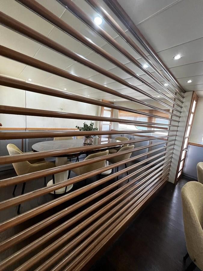 a long row of wooden stairs aboard DEAONE Yacht for Sale