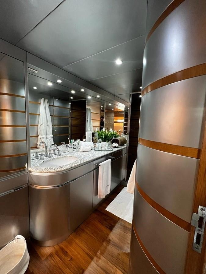 a bathroom with a large mirror aboard DEAONE Yacht for Sale