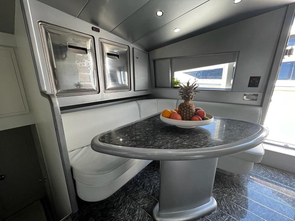 a bowl of fruit on a table aboard DEAONE Yacht for Sale