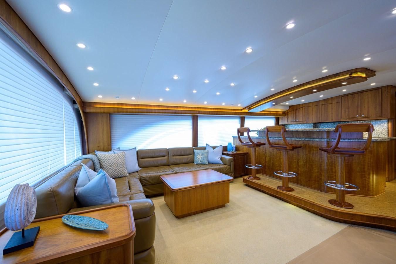 a living room with a large window aboard GEORGIA GIRL Yacht for Sale