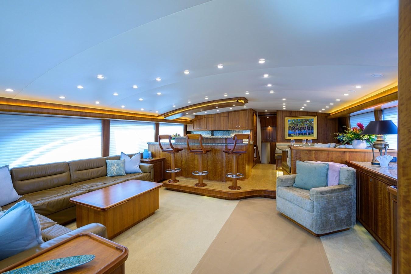 a living room with a large window aboard GEORGIA GIRL Yacht for Sale
