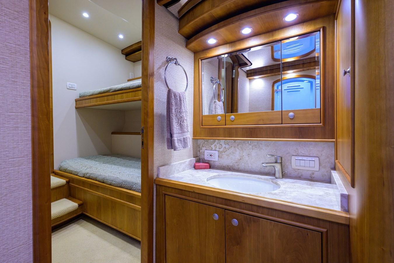a bathroom with a large mirror aboard GEORGIA GIRL Yacht for Sale