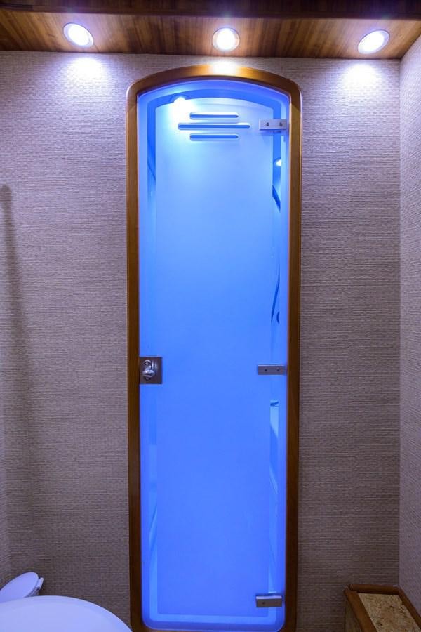 a blue door with a white handle aboard GEORGIA GIRL Yacht for Sale