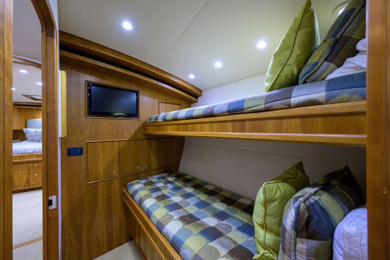 a bed in a room aboard GEORGIA GIRL Yacht for Sale