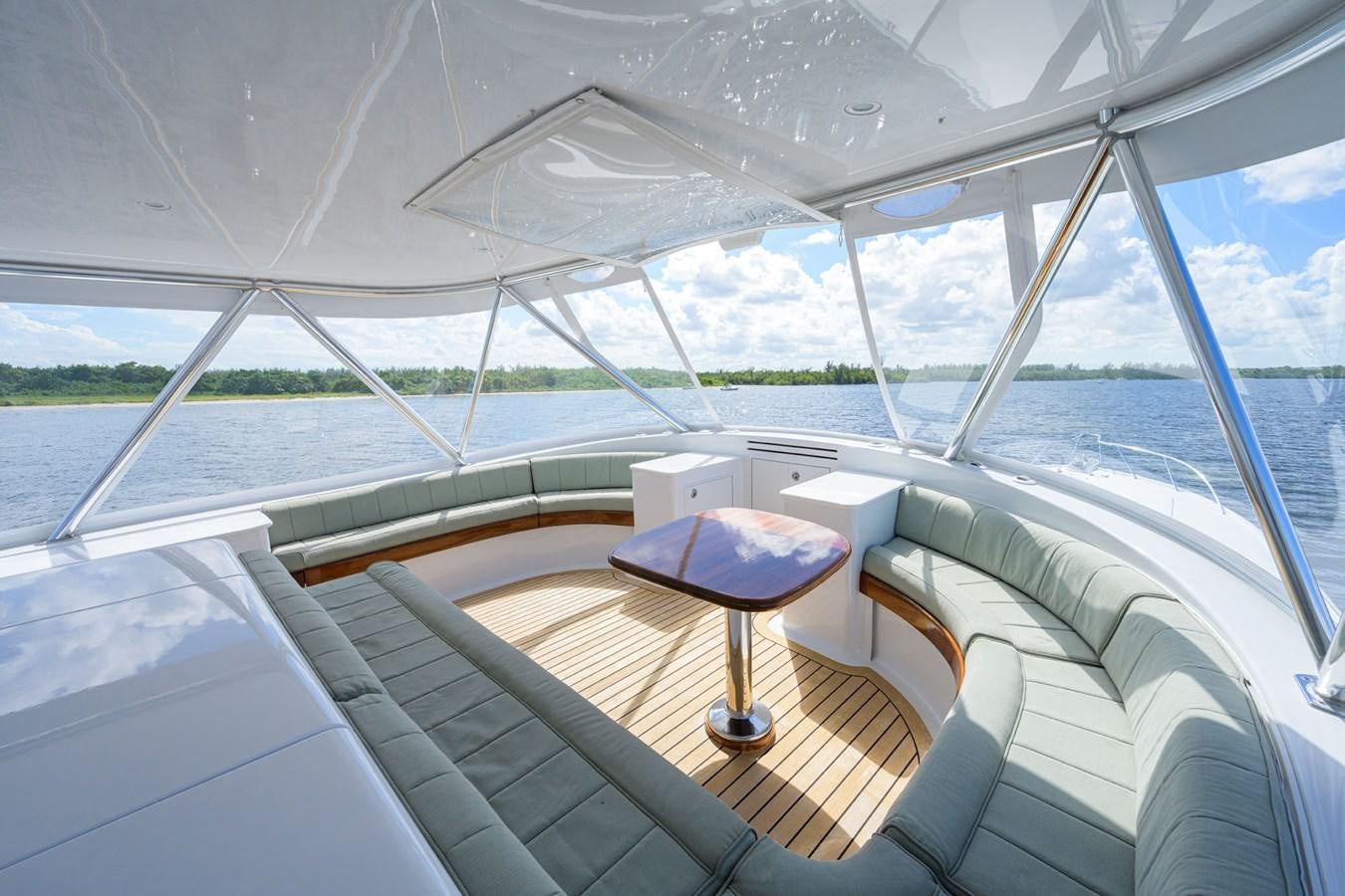 a tent with a table and chairs aboard GEORGIA GIRL Yacht for Sale
