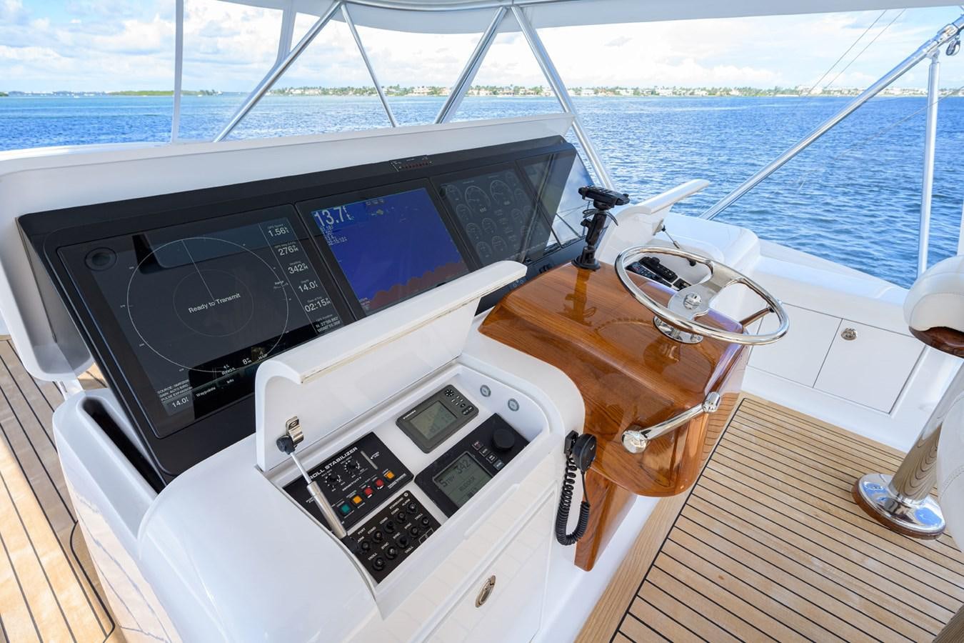 a boat with a radio and a table on it aboard GEORGIA GIRL Yacht for Sale