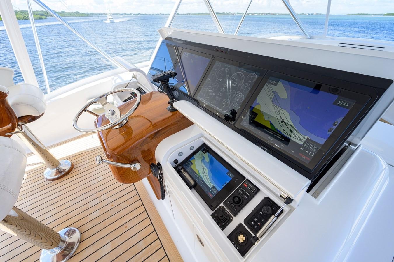 a boat with a television on the deck aboard GEORGIA GIRL Yacht for Sale
