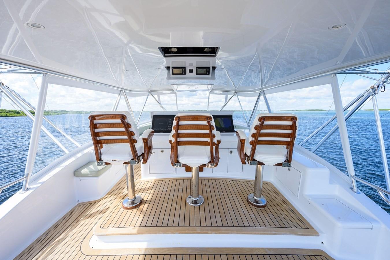 a deck with chairs on it aboard GEORGIA GIRL Yacht for Sale