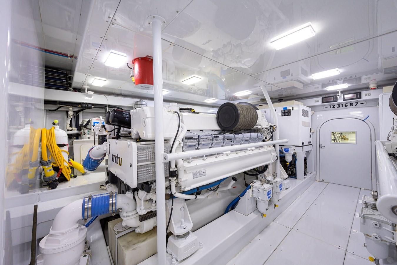 a room with white pipes and equipment aboard GEORGIA GIRL Yacht for Sale