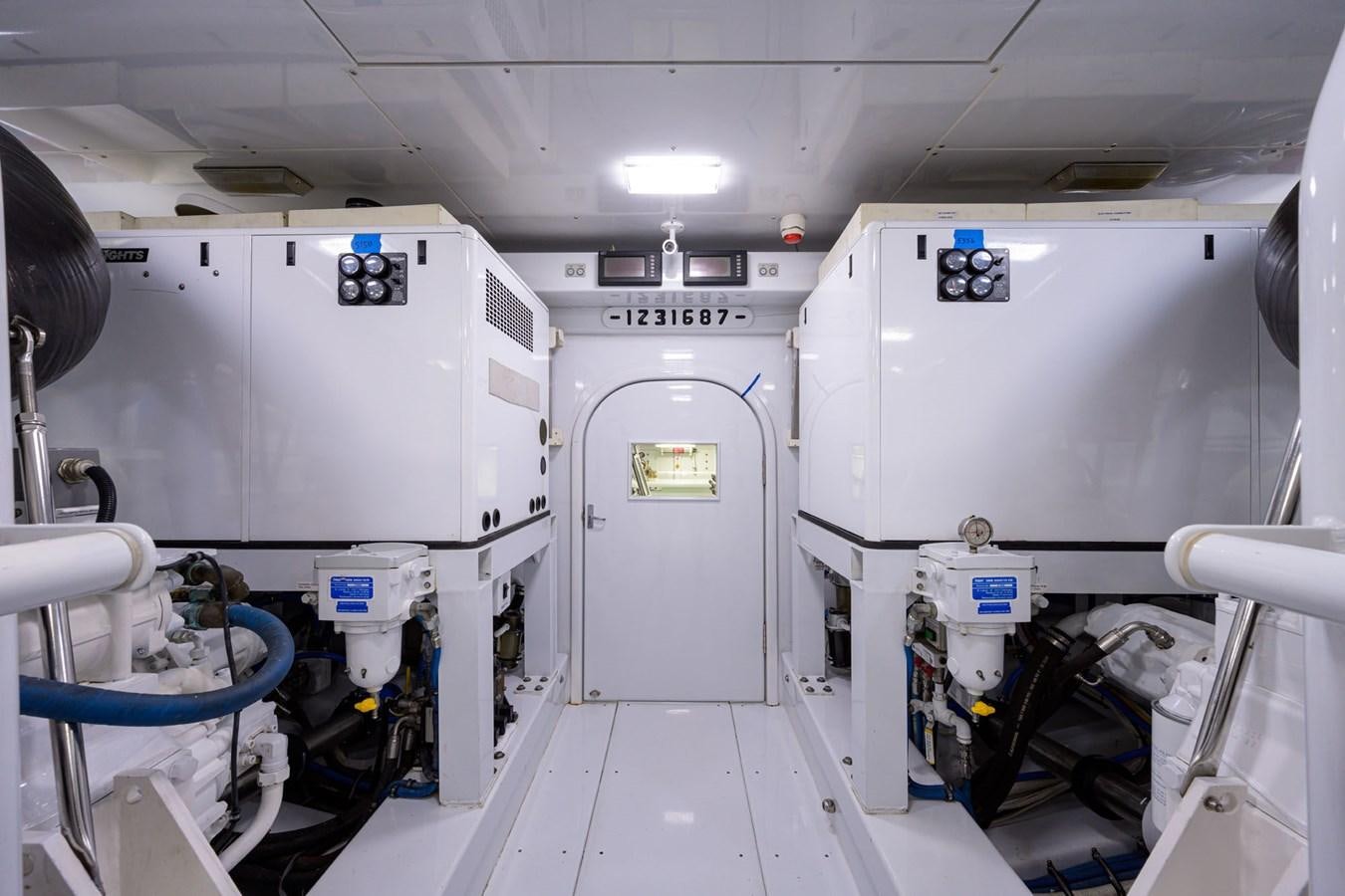 a room with white machines aboard GEORGIA GIRL Yacht for Sale