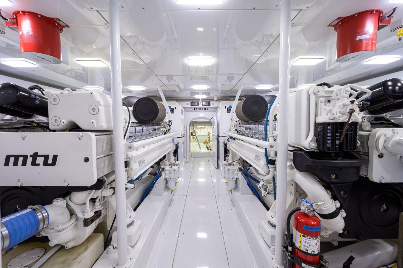 a room with white pipes and equipment aboard GEORGIA GIRL Yacht for Sale