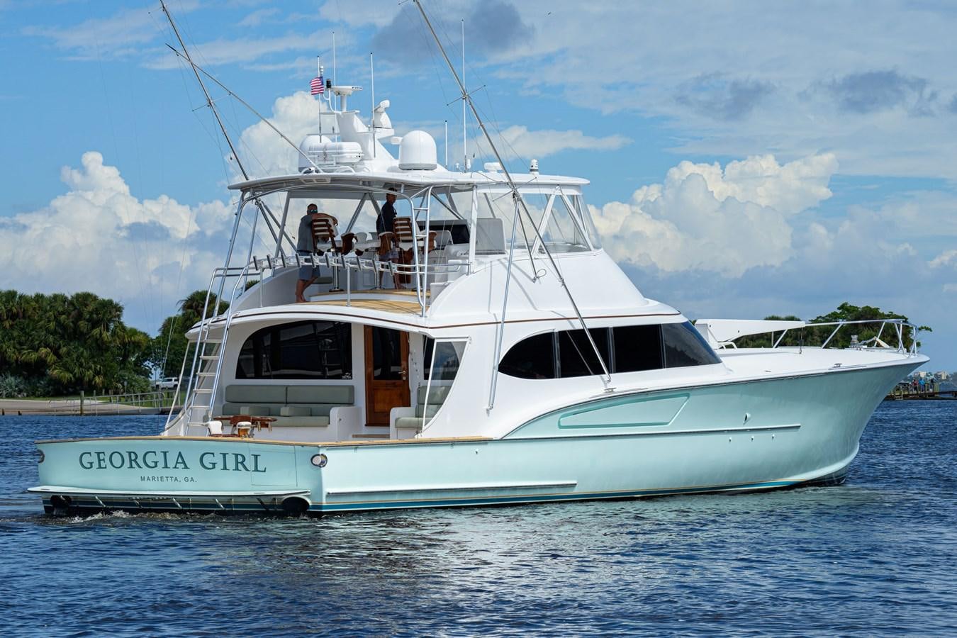 a white boat on the water aboard GEORGIA GIRL Yacht for Sale