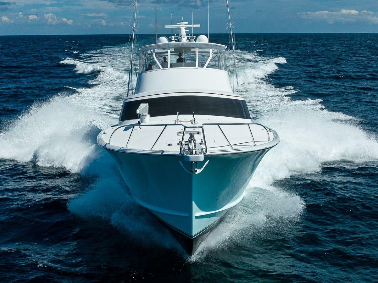 a white boat on the water aboard GEORGIA GIRL Yacht for Sale