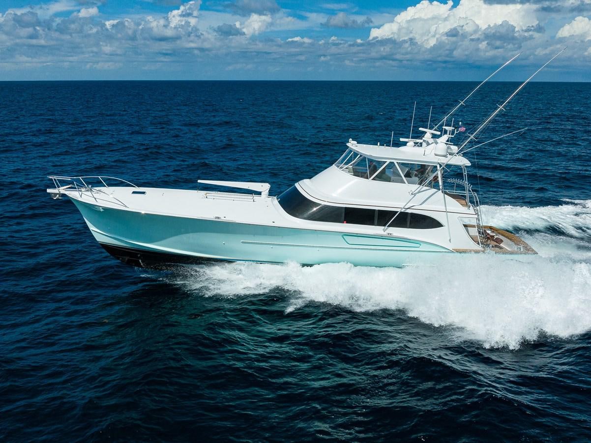 a white boat on the water aboard GEORGIA GIRL Yacht for Sale