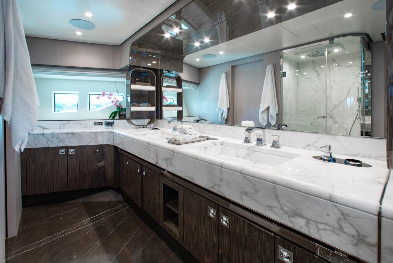 a bathroom with a large countertop aboard INDIGO Yacht for Sale