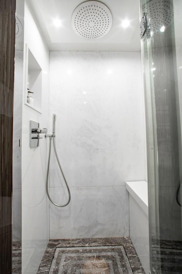 a shower with a shower head aboard INDIGO Yacht for Sale