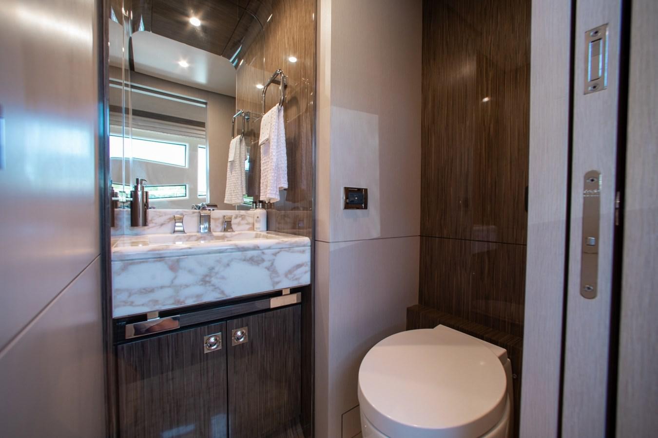 a bathroom with a large jacuzzi tub aboard INDIGO Yacht for Sale