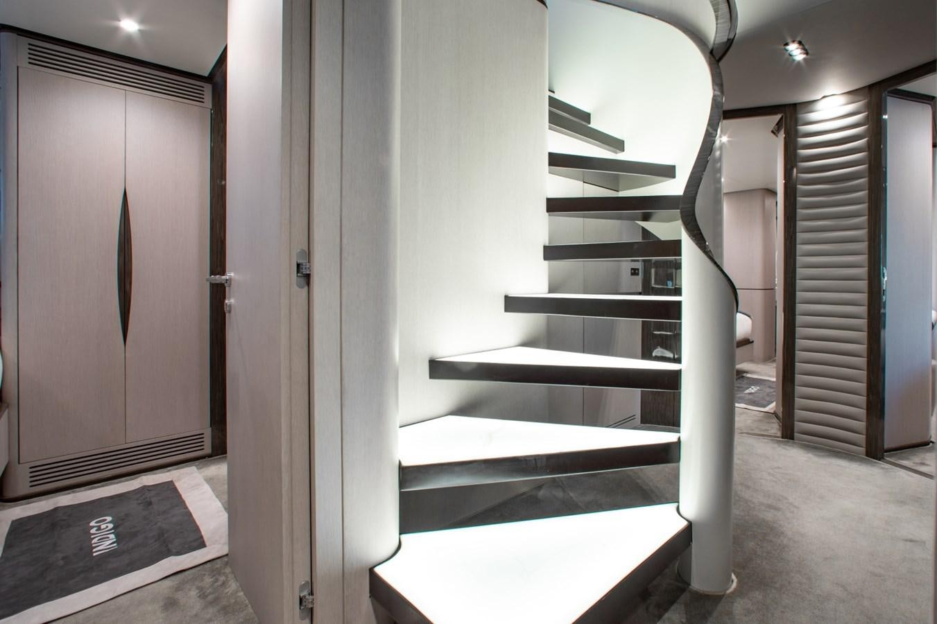a staircase in a building aboard INDIGO Yacht for Sale