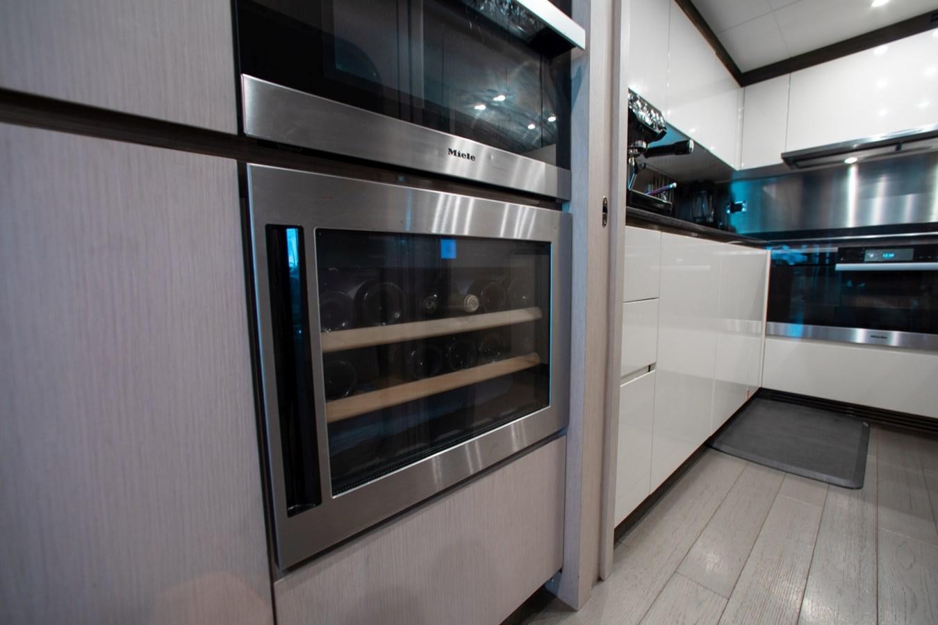 a kitchen with a large oven aboard INDIGO Yacht for Sale