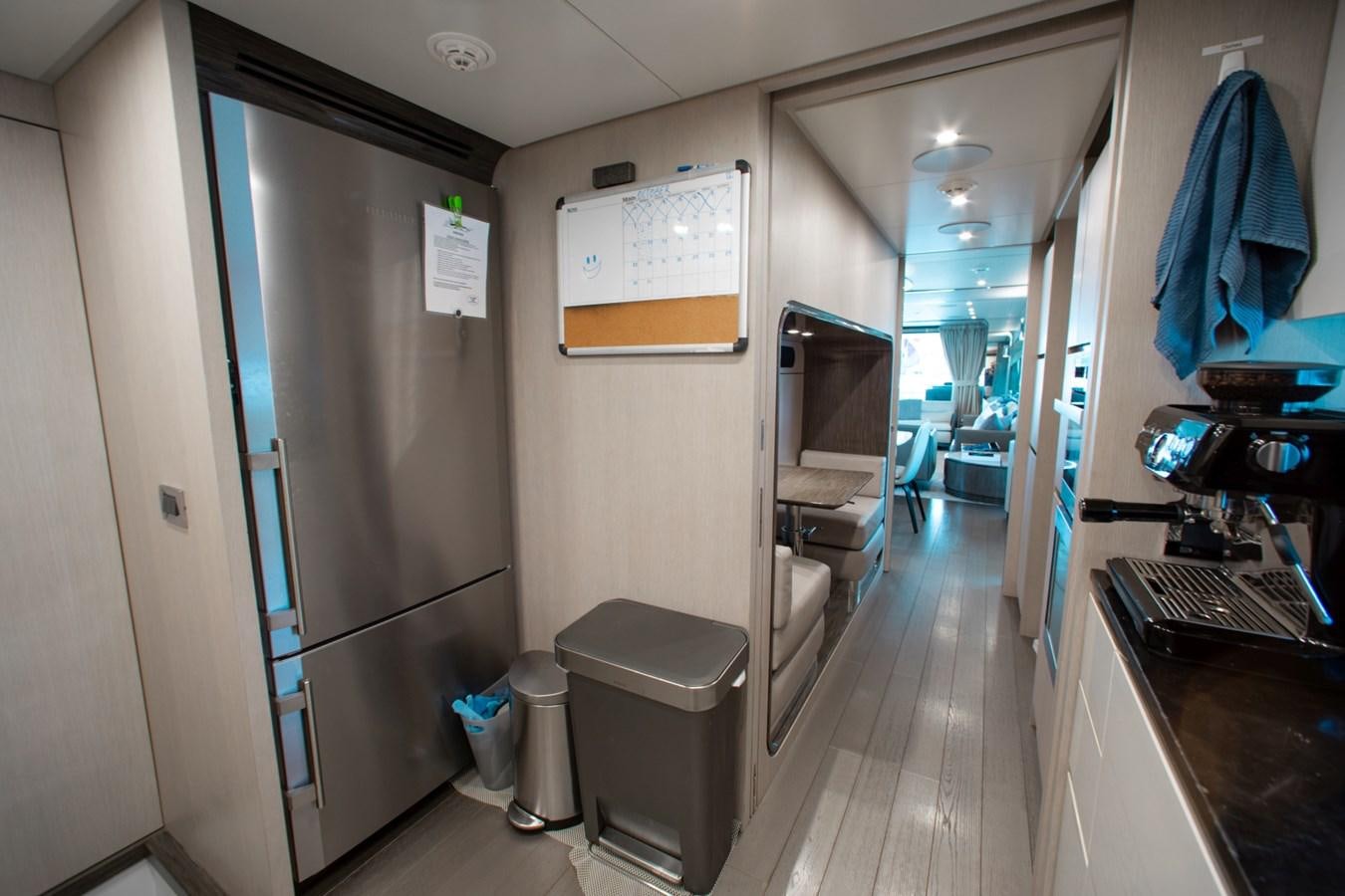 a bathroom with a glass shower aboard INDIGO Yacht for Sale