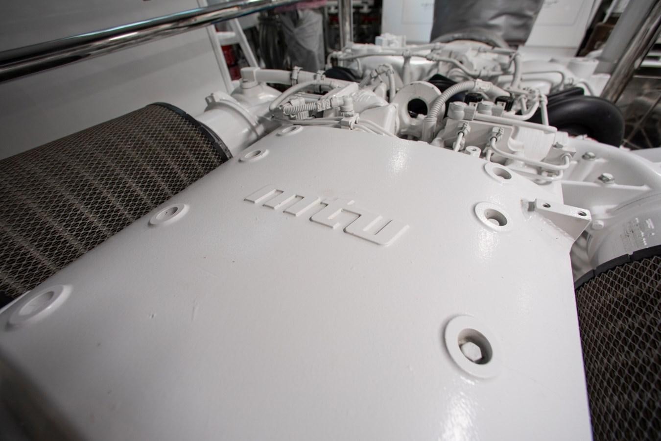 a close-up of a car engine aboard INDIGO Yacht for Sale