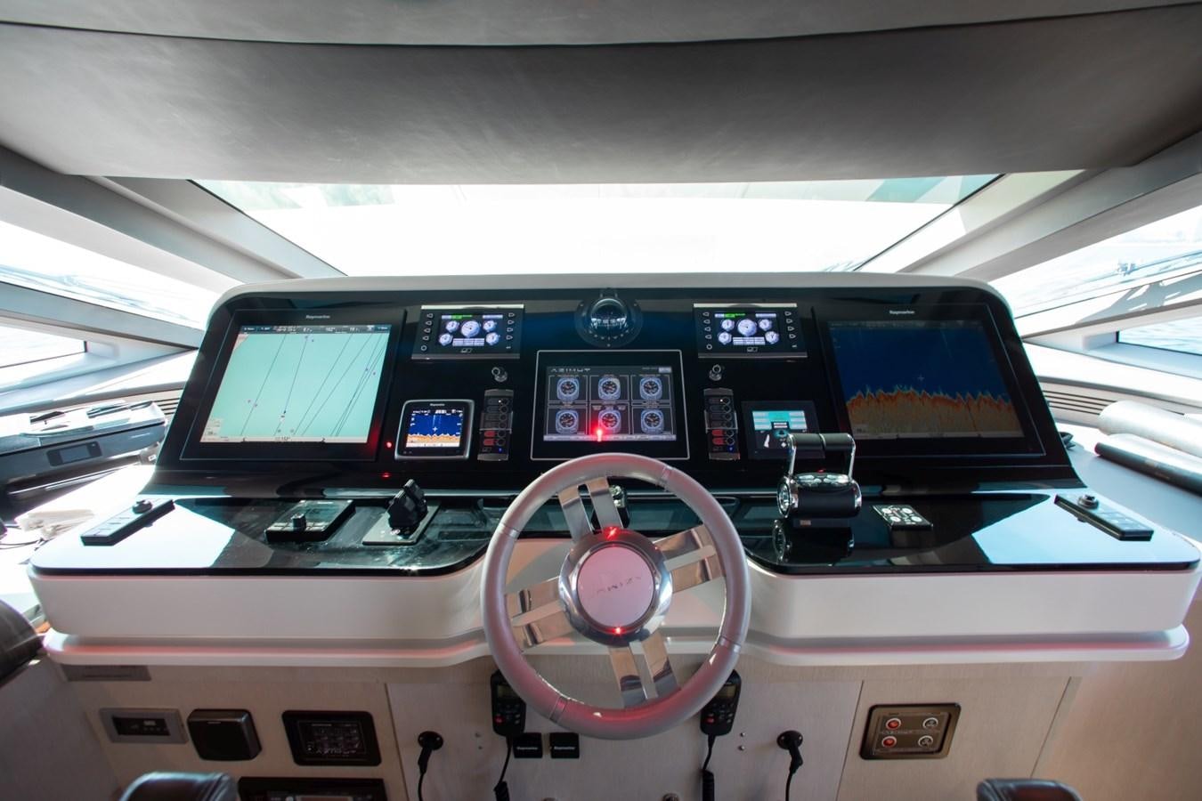the inside of a car aboard INDIGO Yacht for Sale
