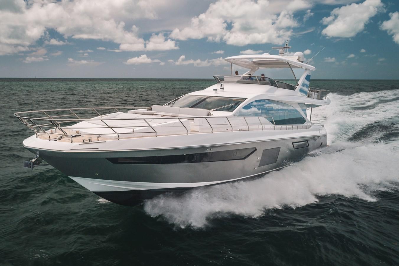 a white yacht on the water aboard 2022 AZIMUT 72 FLYBRIDGE OUR TRADE Yacht for Sale