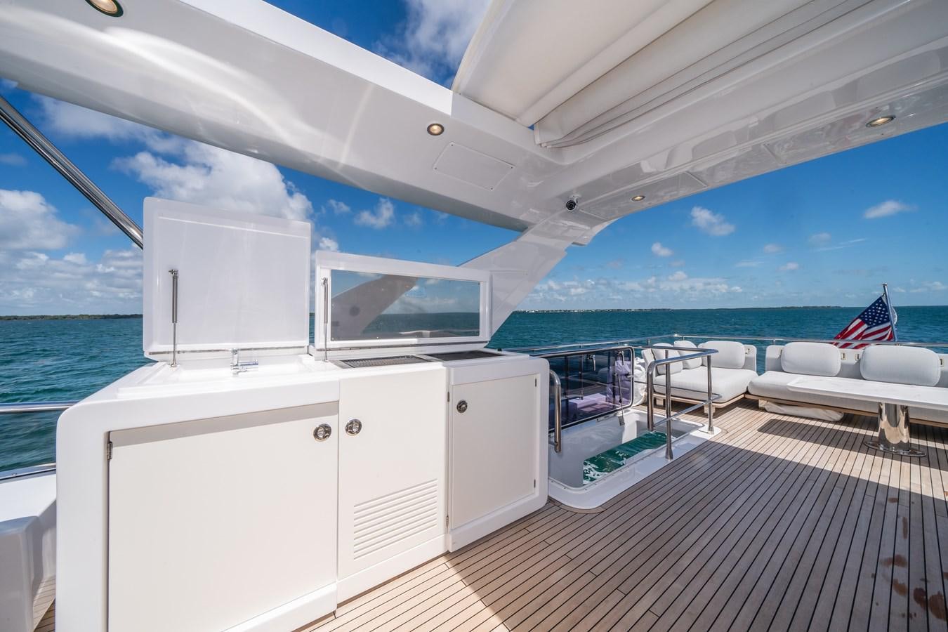 a boat on the water aboard 2022 AZIMUT 72 FLYBRIDGE OUR TRADE Yacht for Sale