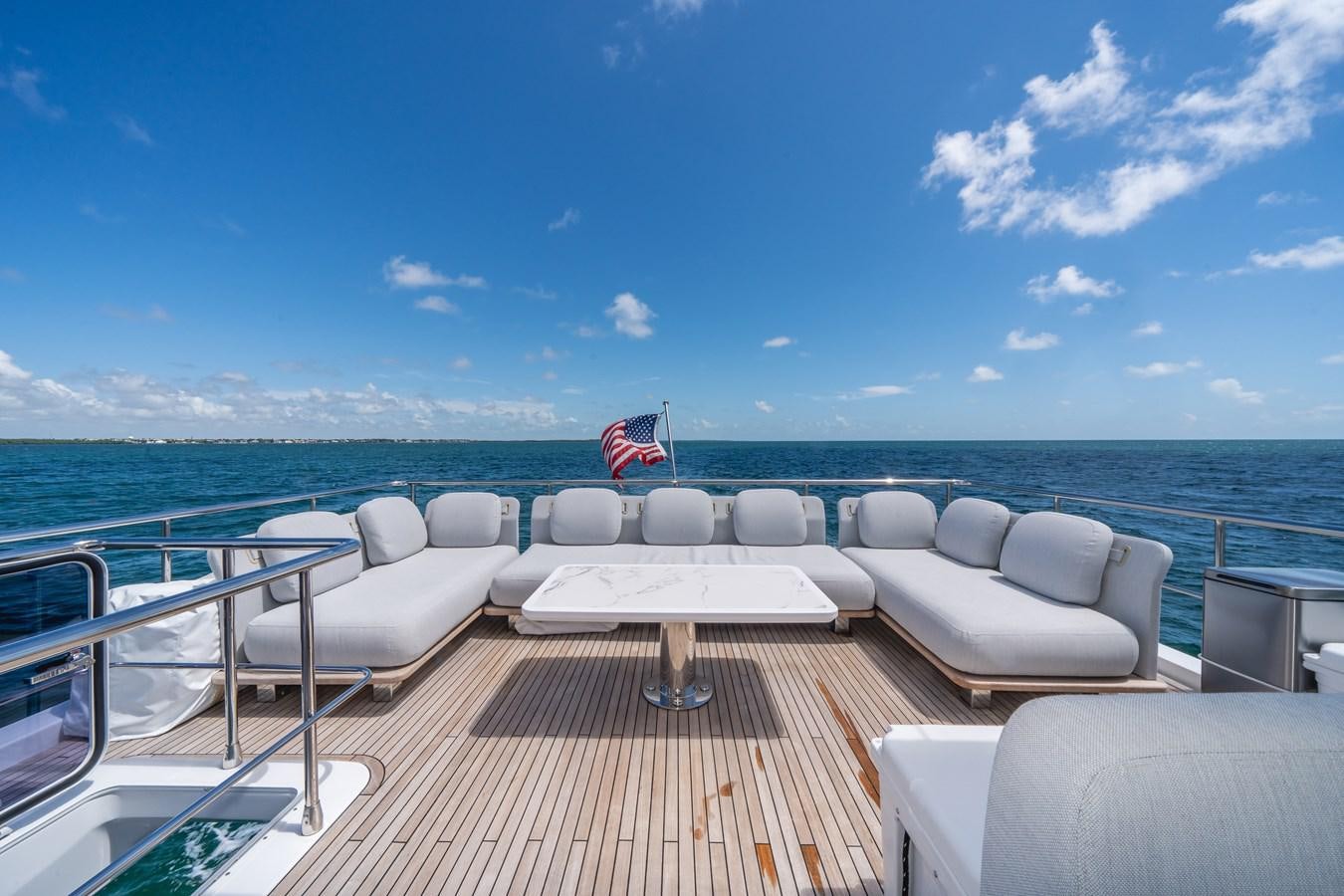 a boat on the water aboard 2022 AZIMUT 72 FLYBRIDGE OUR TRADE Yacht for Sale