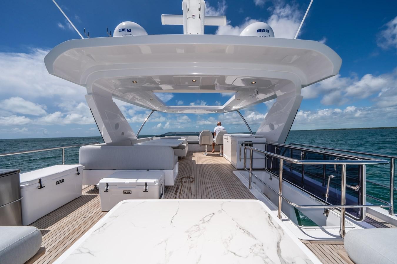 a boat on the water aboard 2022 AZIMUT 72 FLYBRIDGE OUR TRADE Yacht for Sale