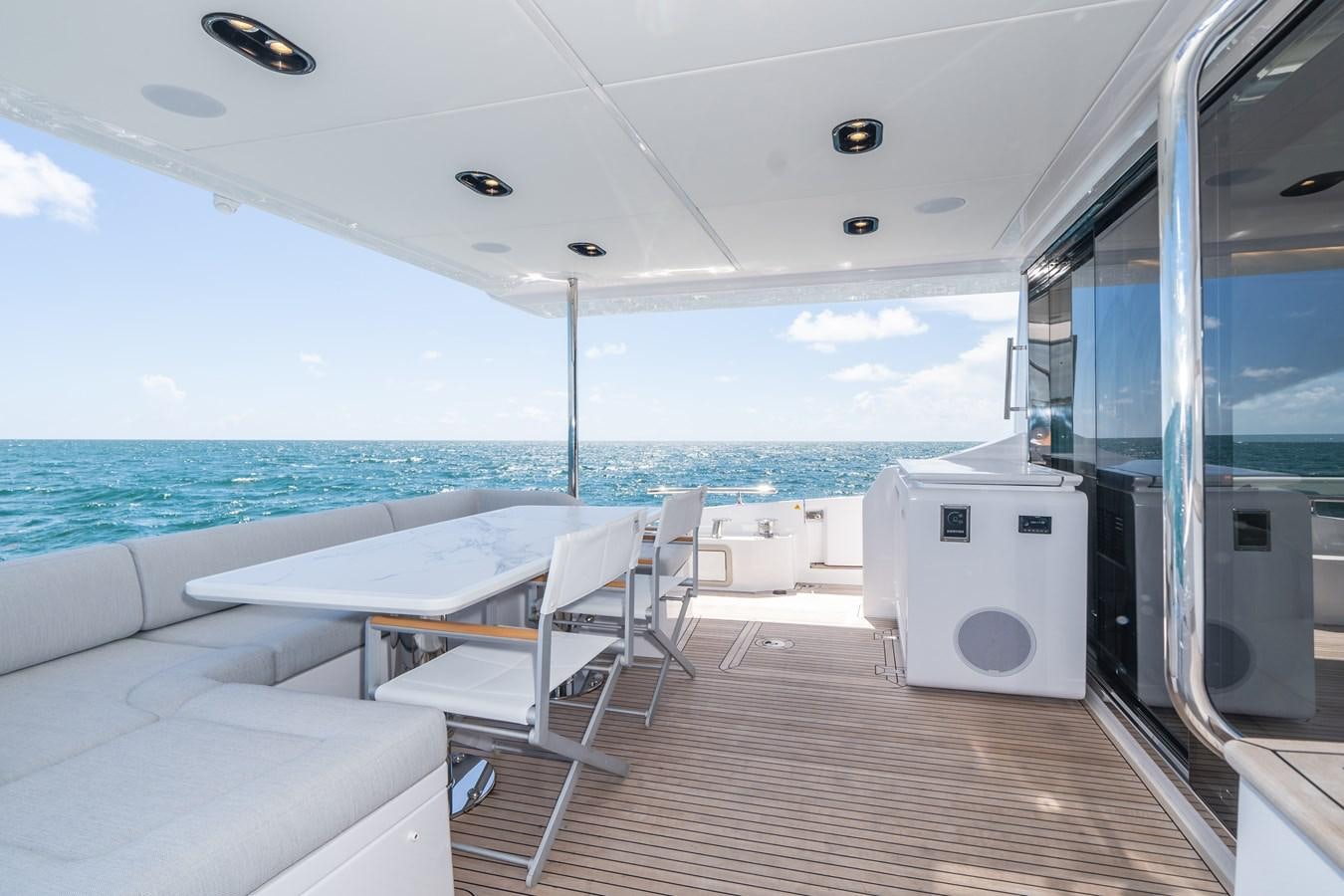 a boat on the water aboard 2022 AZIMUT 72 FLYBRIDGE OUR TRADE Yacht for Sale