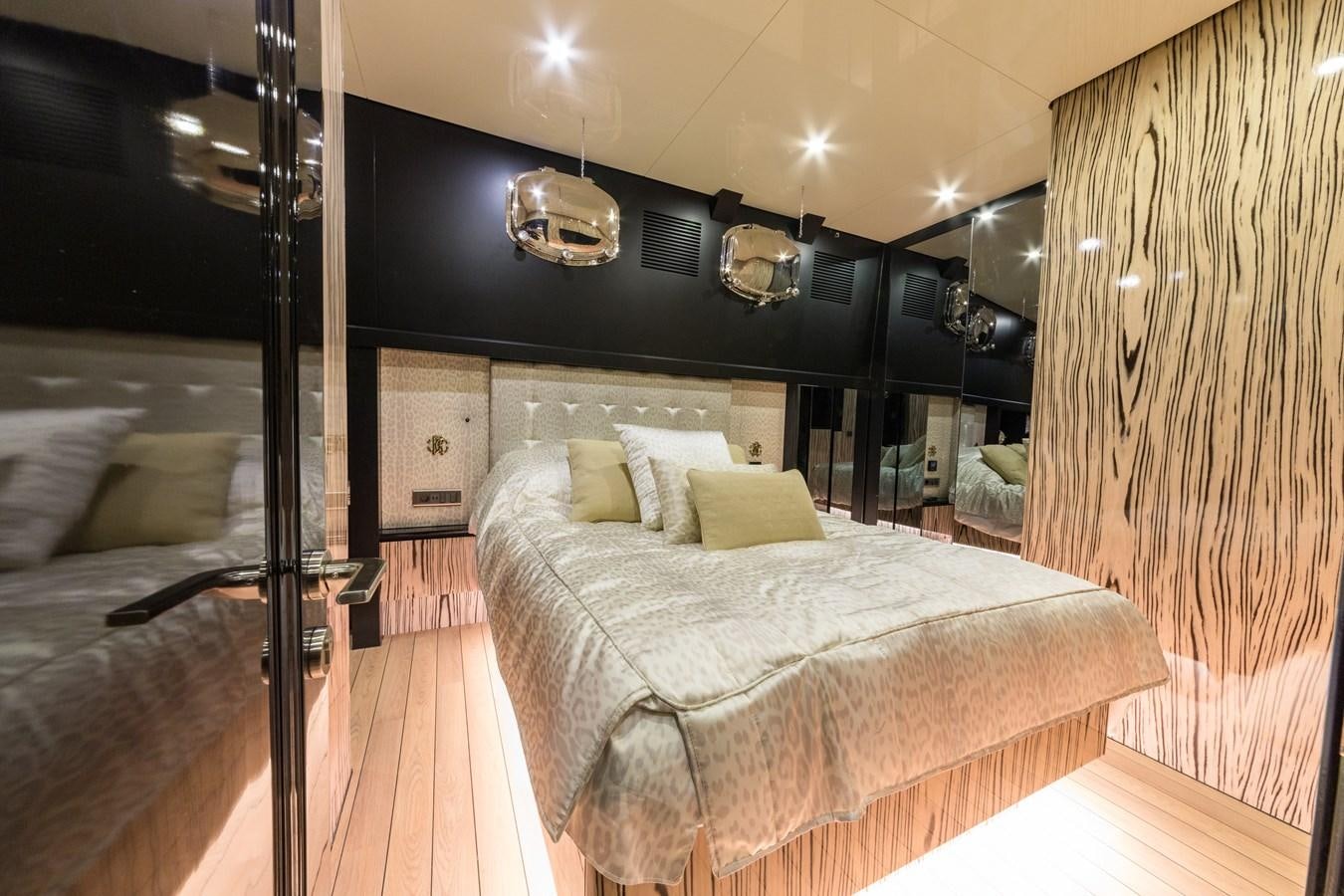 a bed in a room aboard EMANUEL Yacht for Sale