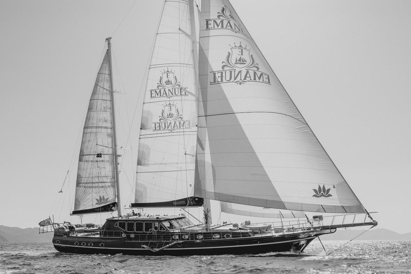 a black and white photo of a sailboat on the water aboard EMANUEL Yacht for Sale
