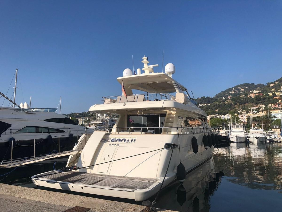 a couple of boats are parked in a harbor aboard OCEAN DELTA 11 Yacht for Sale