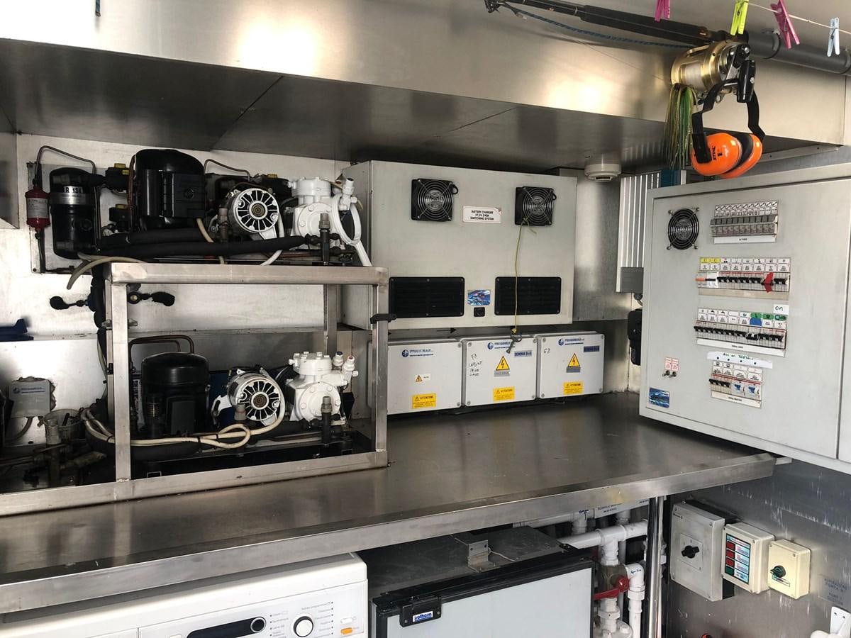 a large industrial machine aboard OCEAN DELTA 11 Yacht for Sale