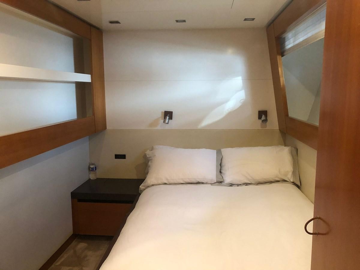 a bed with white sheets aboard OCEAN DELTA 11 Yacht for Sale