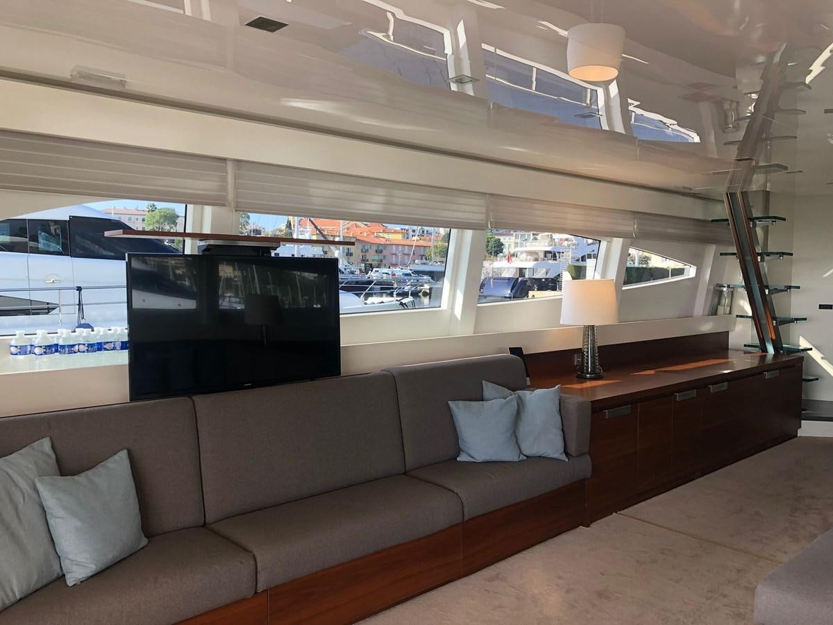 a living room with a large tv aboard OCEAN DELTA 11 Yacht for Sale