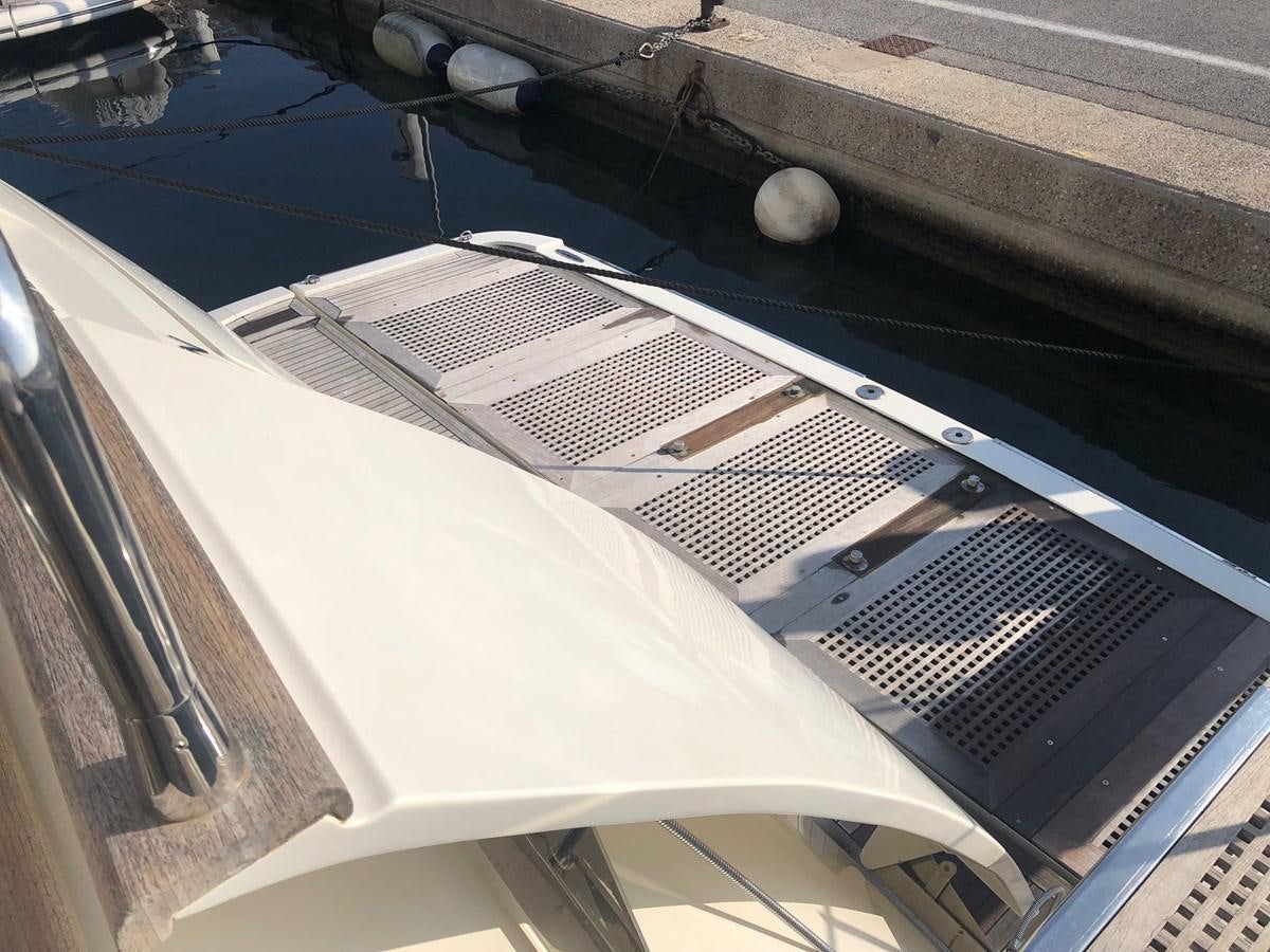 a close-up of a white guitar aboard OCEAN DELTA 11 Yacht for Sale
