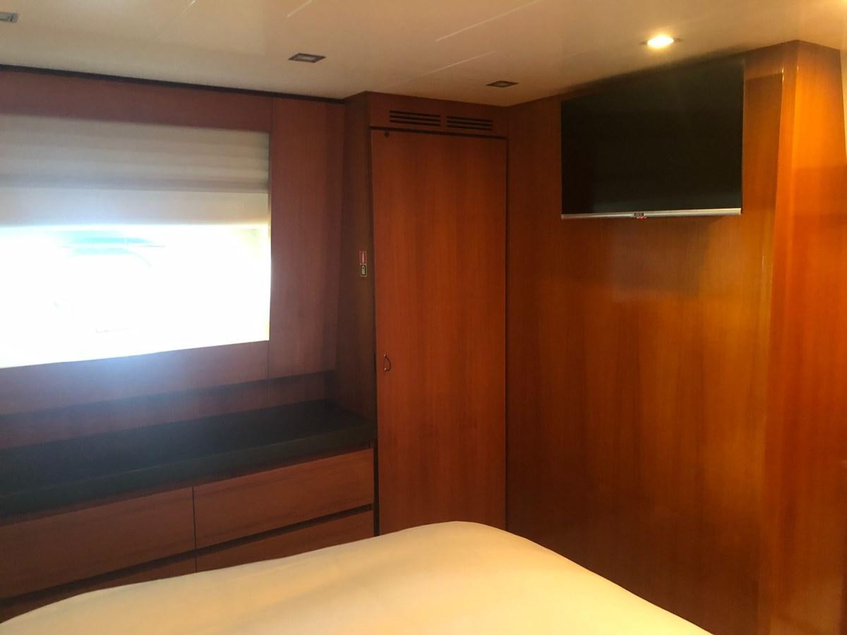 a room with a bed and a window aboard OCEAN DELTA 11 Yacht for Sale
