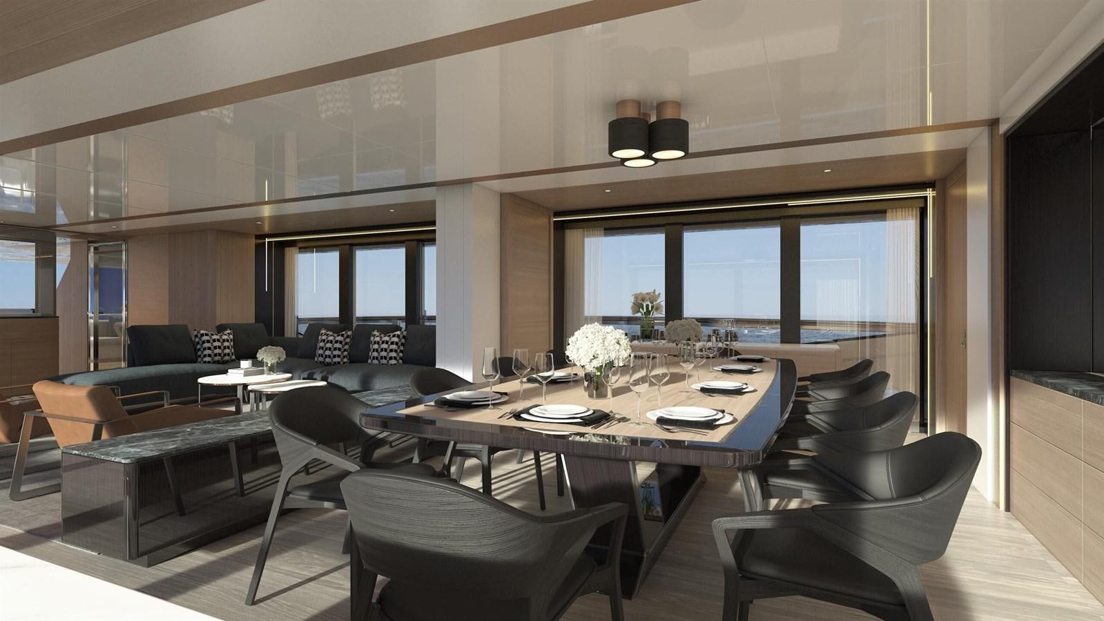 a large room with a table and chairs aboard OCEAN 460 Yacht for Sale