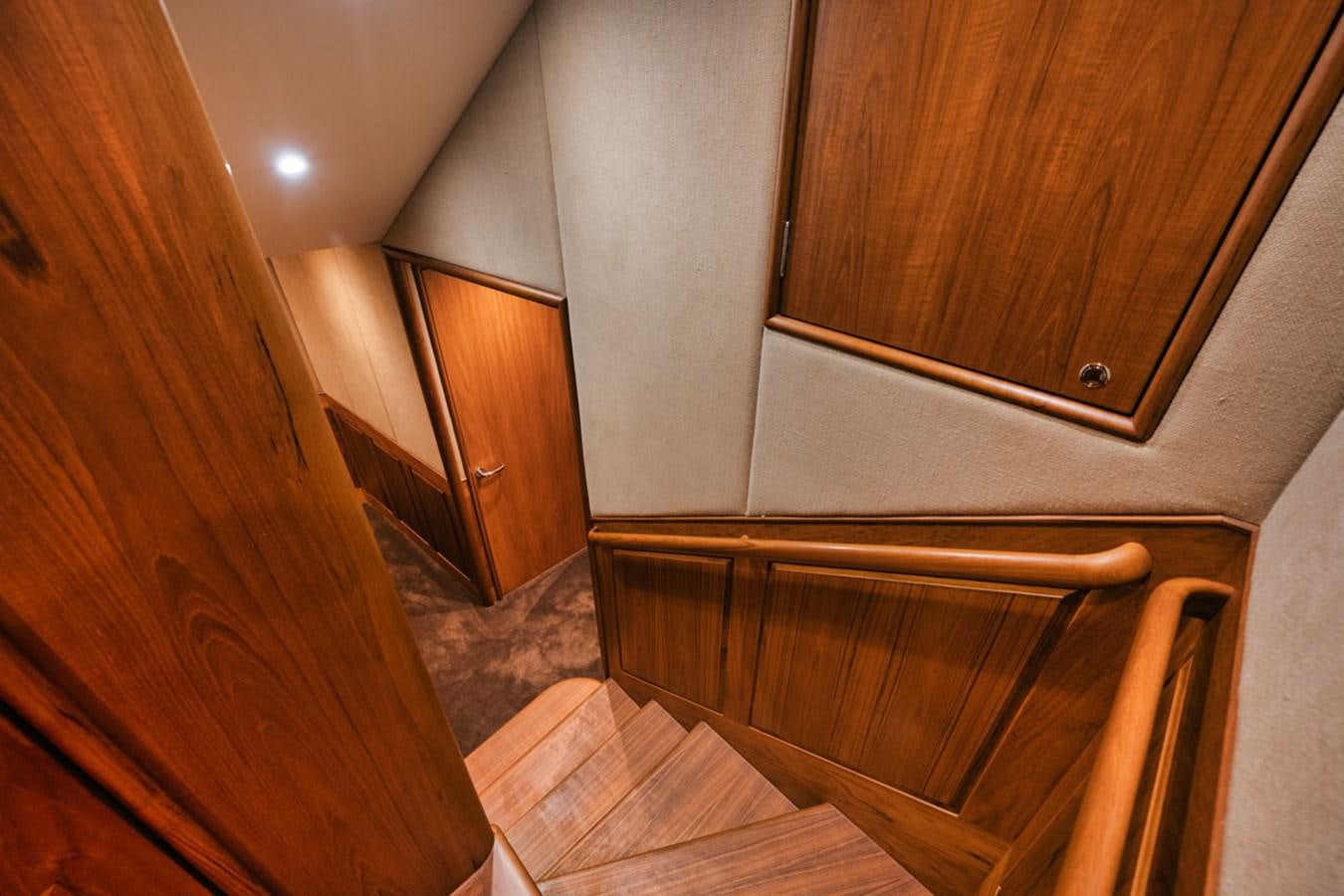 a wooden cabinet in a room aboard OWL'S NEST Yacht for Sale